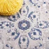 Tapete Palmar de Flores Dispersas en Gris con Azul