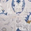 Tapete Palmar de Flores Dispersas en Gris con Azul