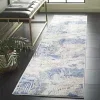 Tapete Palmar de Líneas Ondulantes en Beige con Azul