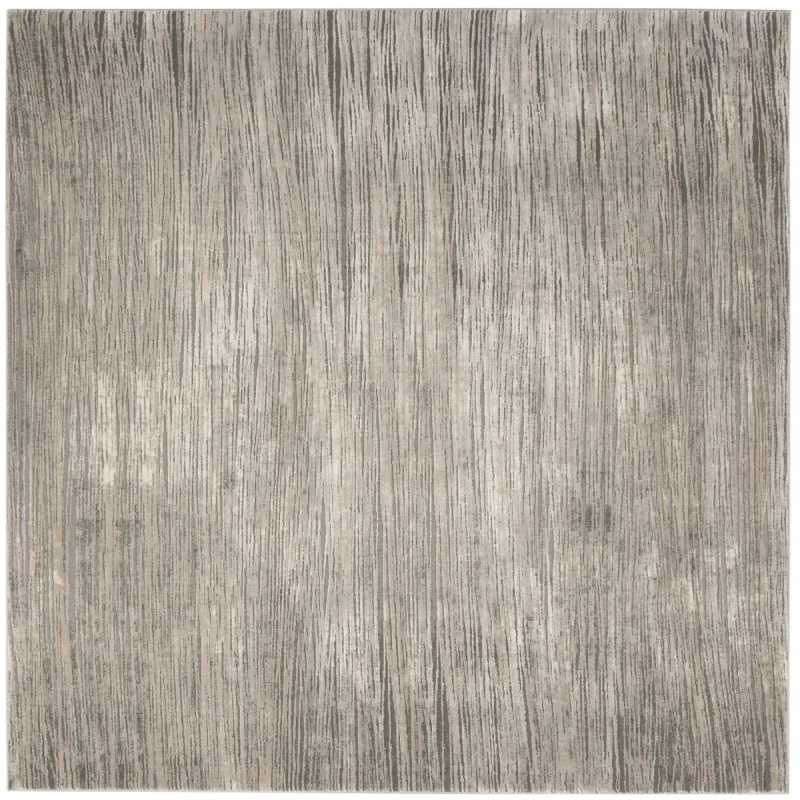 Tapete Prado Abstracto en Marfil con Gris