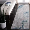 Tapete Prado de Brochazos Desgastado en Gris con Azul