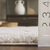 Tapete Shag Miami de Curvas en Natural con Marfil