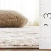 Tapete Shag Pacífico de Textura Lineal en Marfil con Beige