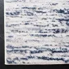 Tapete Emilia Arenas Grises con Azul Marino
