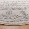 Tapete Tula de Franjas Ornamentales en Marfil con Gris
