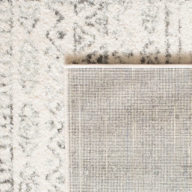 Tapete Tula de Franjas Ornamentales en Marfil con Gris