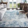Tapete Westside Moderno en Marfil con Azul