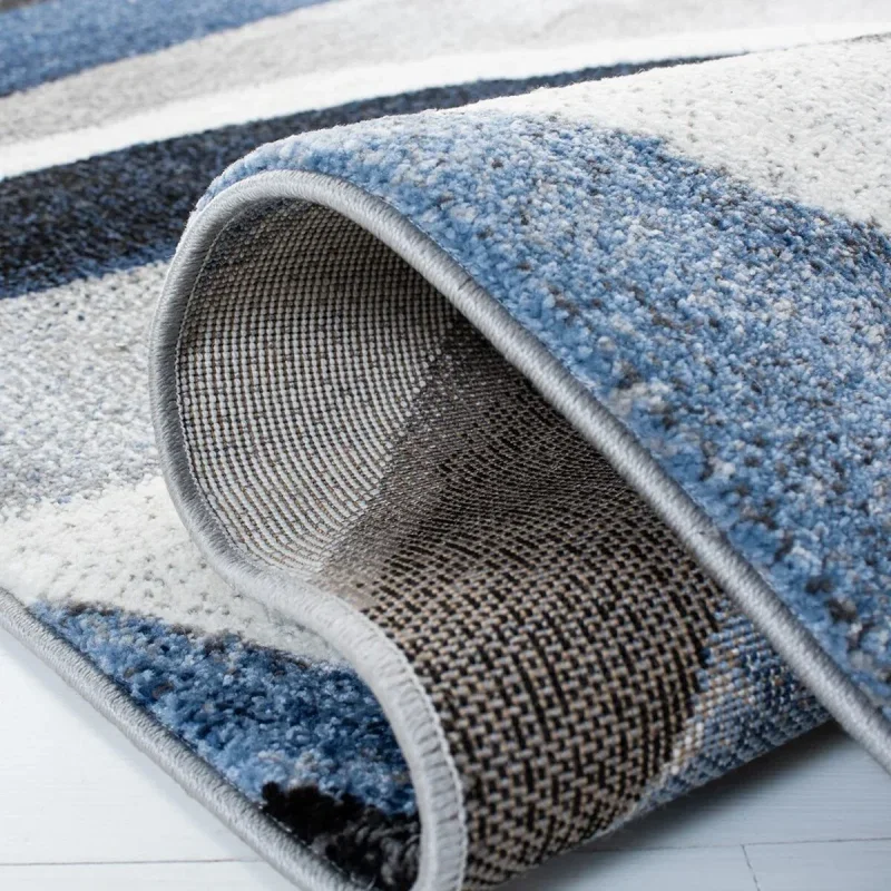 Tapete Actores Abstracto en Gris con Azul