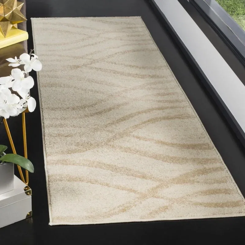 Tapete Adira Brochas Onduladas en Marfil con Beige