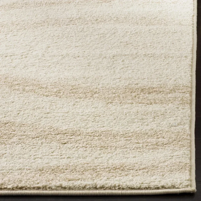 Tapete Adira Brochas Onduladas en Marfil con Beige
