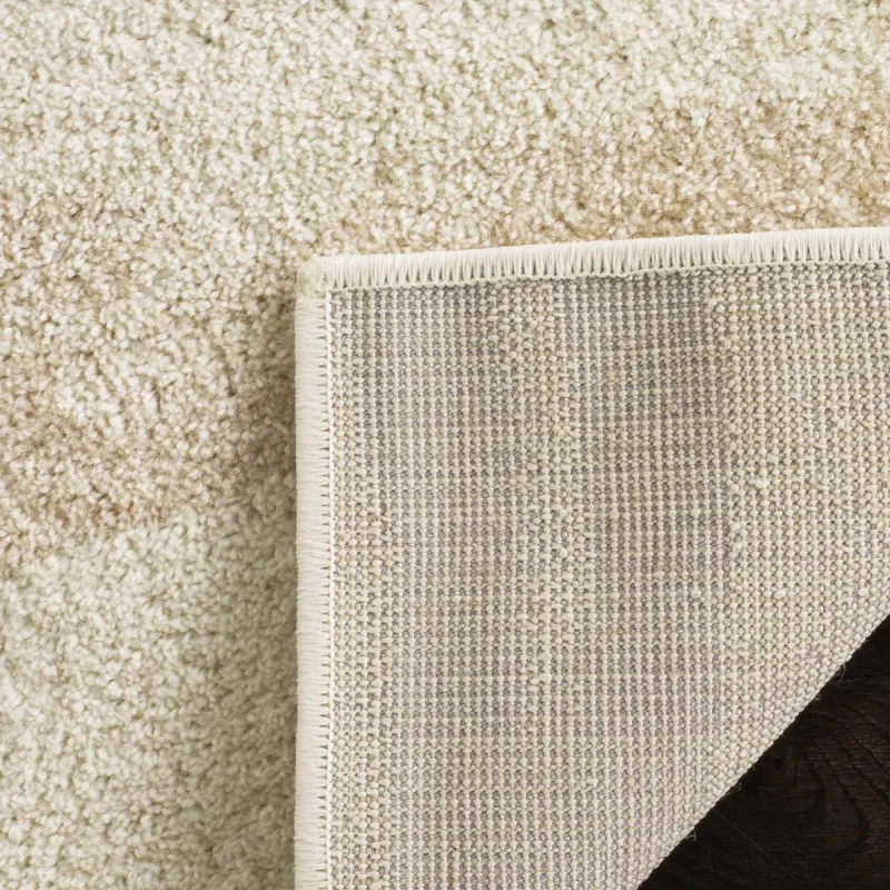 Tapete Adira Brochas Onduladas en Marfil con Beige