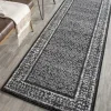 Tapete Adira de Diamantes en Negro con Gris