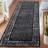 Tapete Adira de Diamantes en Negro con Gris