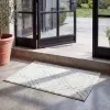 Tapete Adira Geométrico en Marfil con Verde Salvia