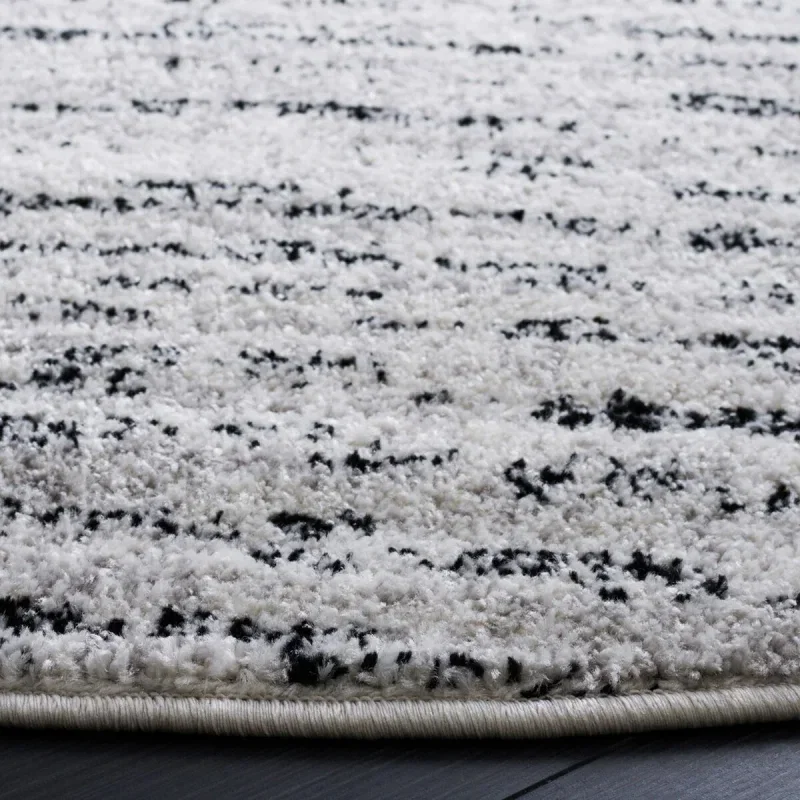 Tapete Adira Moderno en Marfil con Gris