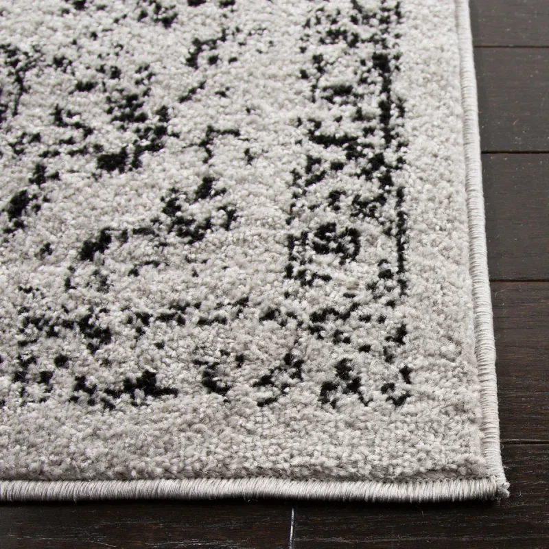 Tapete Adira Tradicional Floral en Gris con Negro