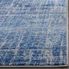 Tapete Adira Vintage Pátina en Azul con Gris