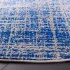 Tapete Adira Vintage Pátina en Azul con Gris