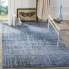 Tapete Adira Vintage Pátina en Azul con Gris