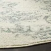 Tapete Adira Vintage Pátina en Marfil con Gris