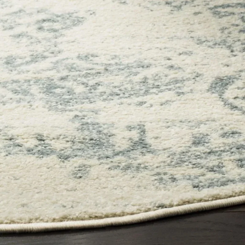 Tapete Adira Vintage Pátina en Marfil con Gris