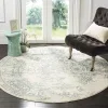 Tapete Adira Vintage Pátina en Marfil con Gris