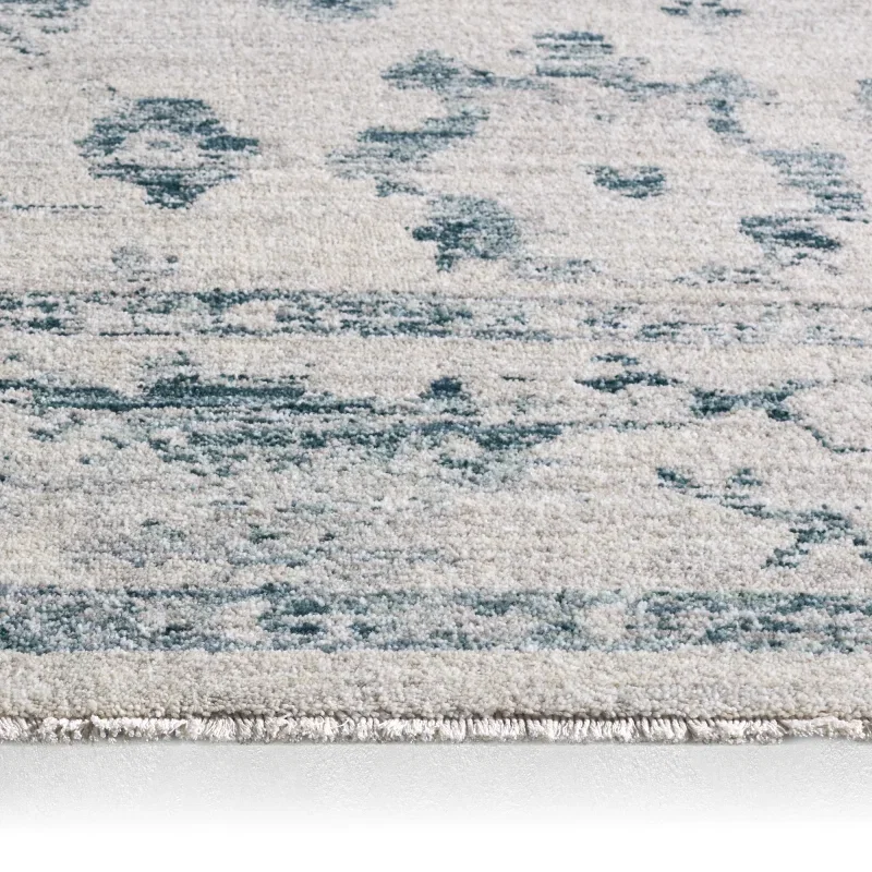 Tapete Dalia Floral Desgastado en Azul y Gris