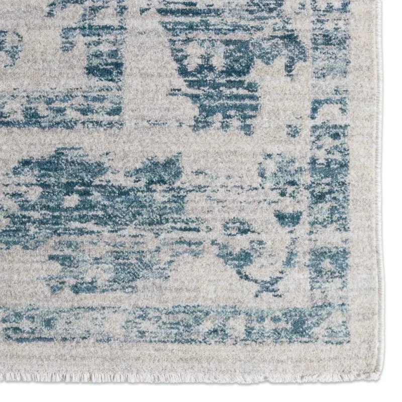 Tapete Dalia Floral Desgastado en Azul y Gris