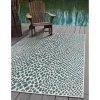exterior hamptons animal print en verde azulado