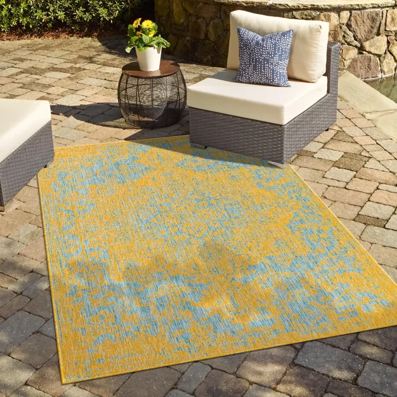 exterior hamptons vintage en amarillo y aqua