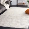 Tapete Melodía de Rayas en Marfil con Negro