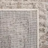 Tapete Memoria Vintage en Marfil con Taupe