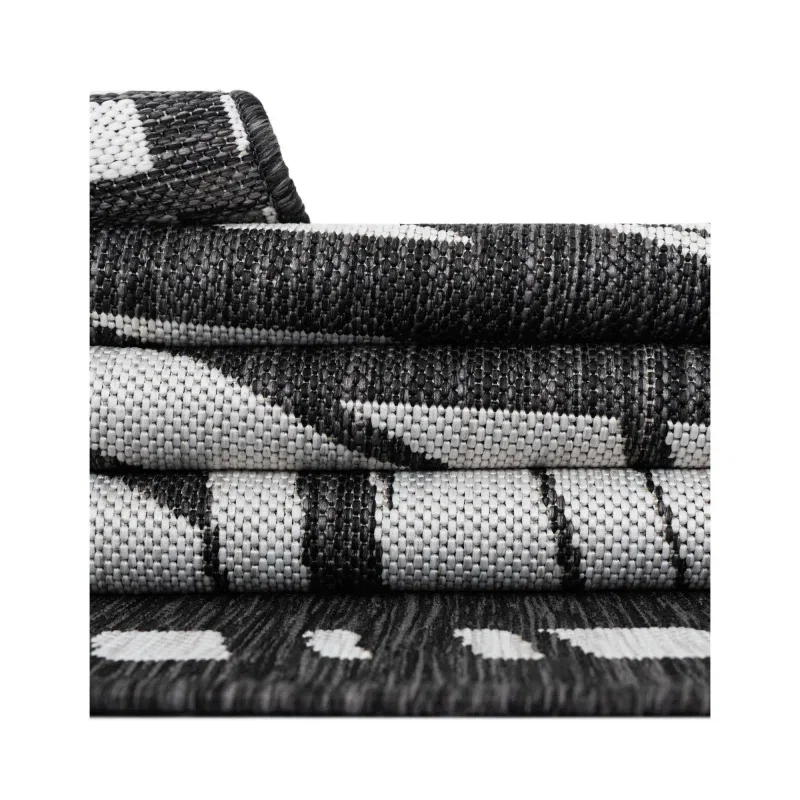 moderno exterior negro y blanco de rayas entrelazadas