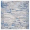 Tapete Palmar de Ondas Fluidas en Beige con Azul