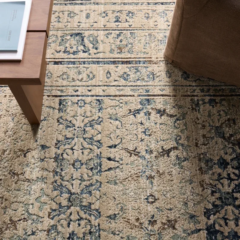 Tapete Susurro Ikat Vintage en Azul y Gris