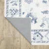 Tapete Adina Oushak en Marfil con Azul sobre el piso 3