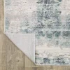 Tapete Cava Abstracto en Marfil con Azul Petróleo sobre el piso 3