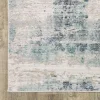 Tapete Cava Abstracto en Marfil con Azul Petróleo sobre el piso 4