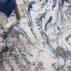 Tapete Destreza de Remolinos Fluidos en Gris con Azul