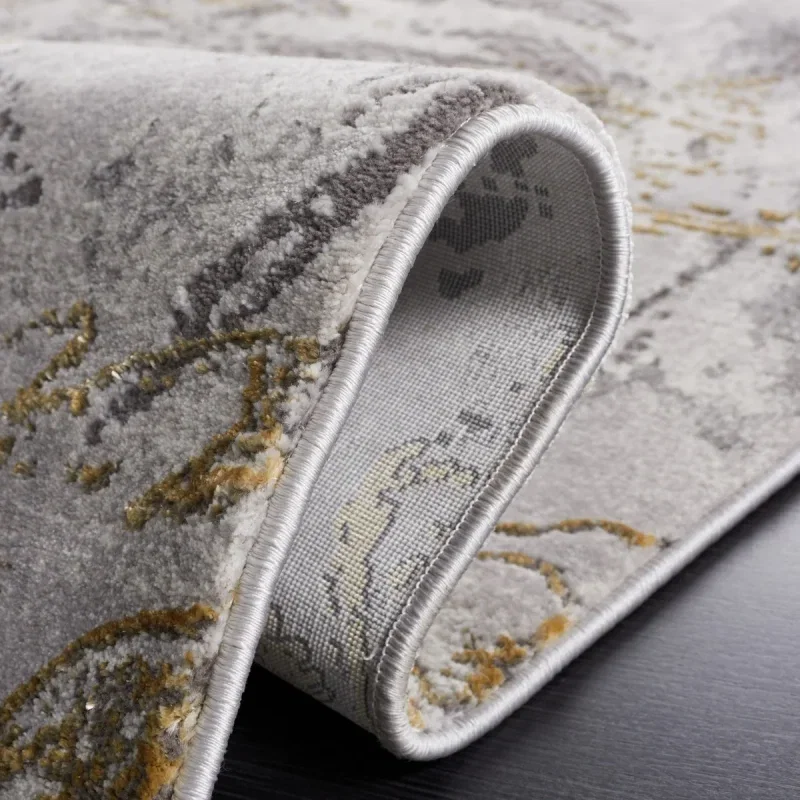 Tapete Destreza de Volutas Distressed en Gris con Dorado