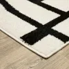 Tapete Reyna Deco en Marfil con Negro, detalle de la textura