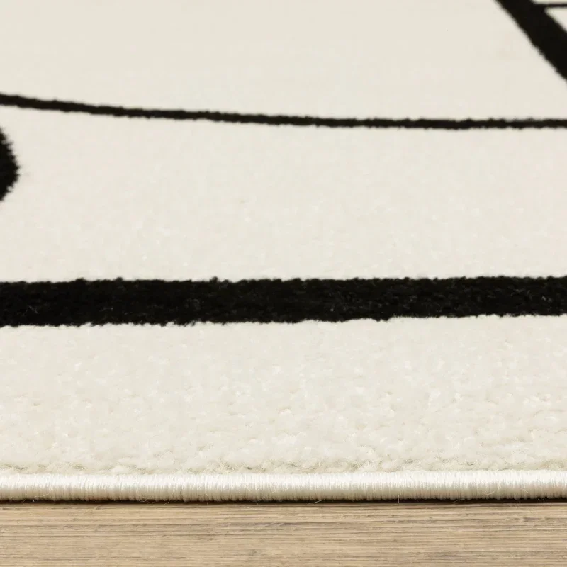 Tapete Reyna Deco en Marfil con Negro, detalle de la textura 2