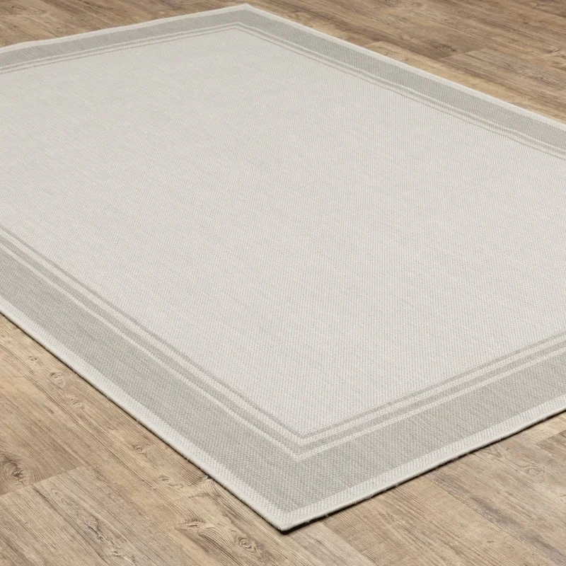 Tapete Riviera Liso con Borde en Marfil