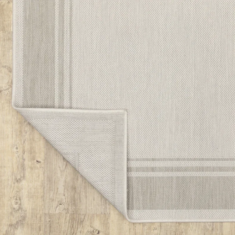 Tapete Riviera Liso con Borde en Marfil