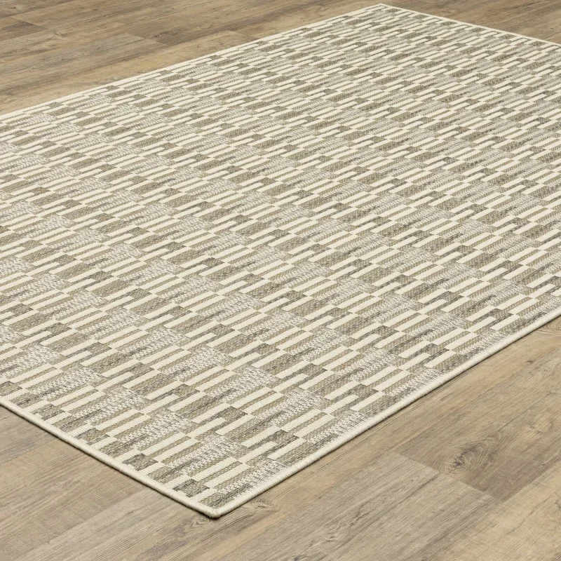 Tapete Zaira Geométrico en Beige sobre el piso