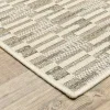 Tapete Zaira Geométrico en Beige, detalle de la textura