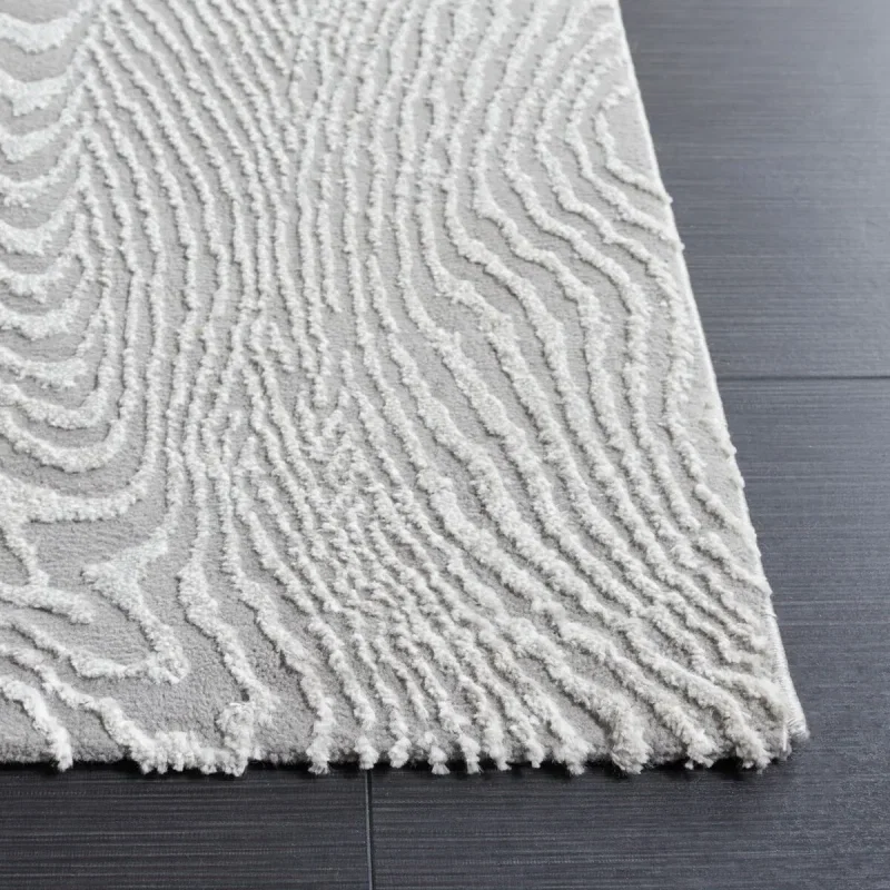 Tapete Renace Ondas Concéntricas en Gris
