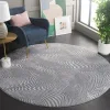 Tapete Renace Ondas Concéntricas en Gris