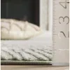 Tapete Renace Ondas Concéntricas en Verde Salvia con Marfil