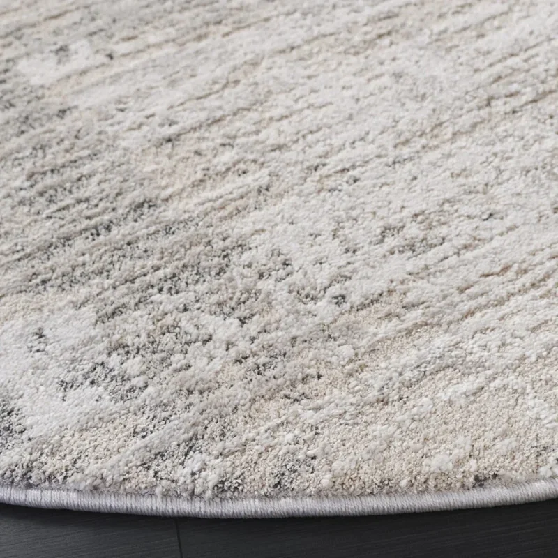 Tapete Puerto Erosionado en Marfil con Gris